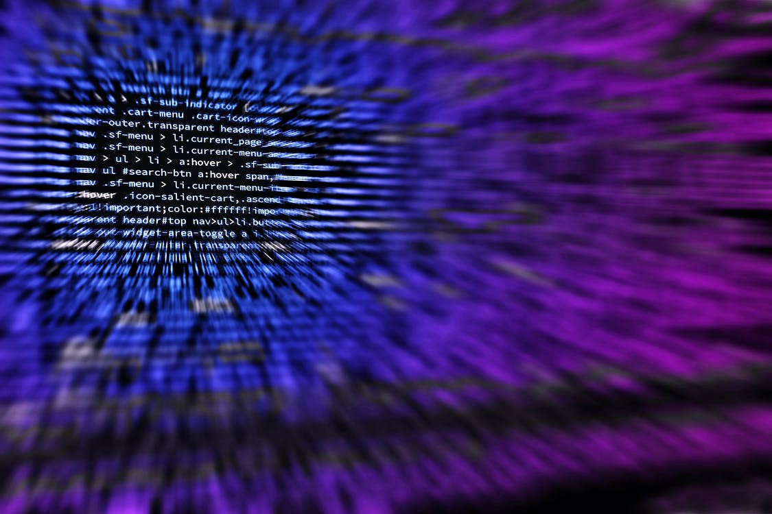 A blurred page of code