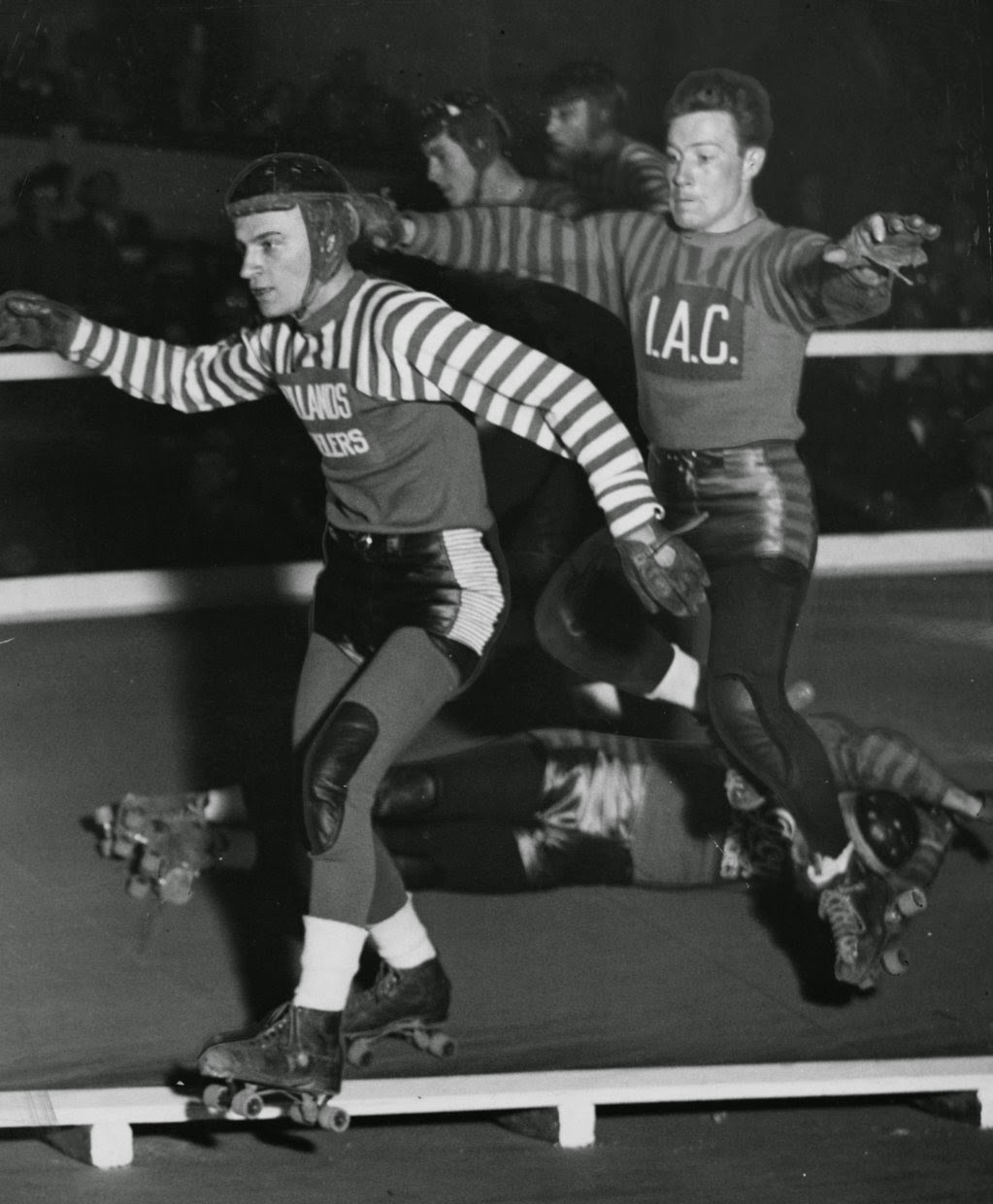 Two men rollerblading