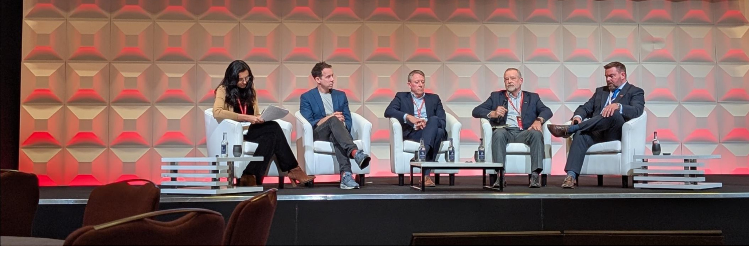 Image of panellists on the stage at Wales Tech Week