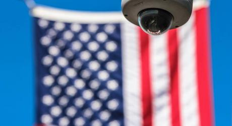 CCTV against an American flag background