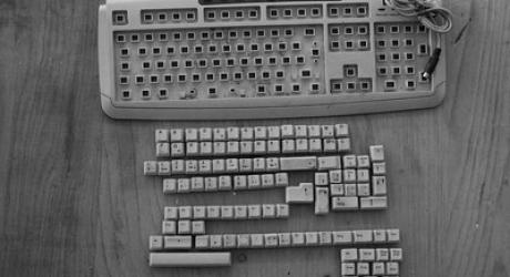 An old keyboard taken apart