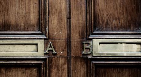 A and B letterboxes on a door