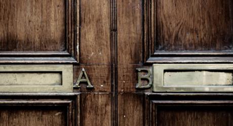 A and B letterboxes on a door