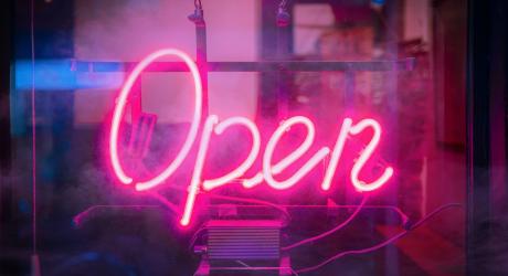 Neon sign saying "open"