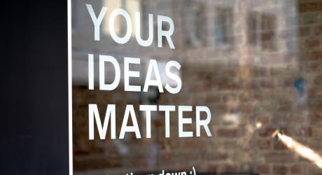 Sign saying "your ideas matter. Write them down"