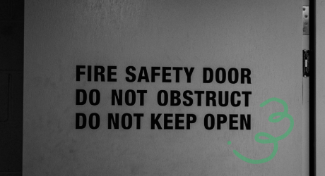 Open fire safety door with the text "Do not keep open"