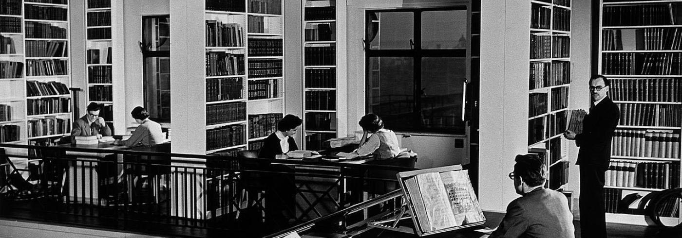 1950s image of people wearing suits in Wellcome Trusts Gallery Library