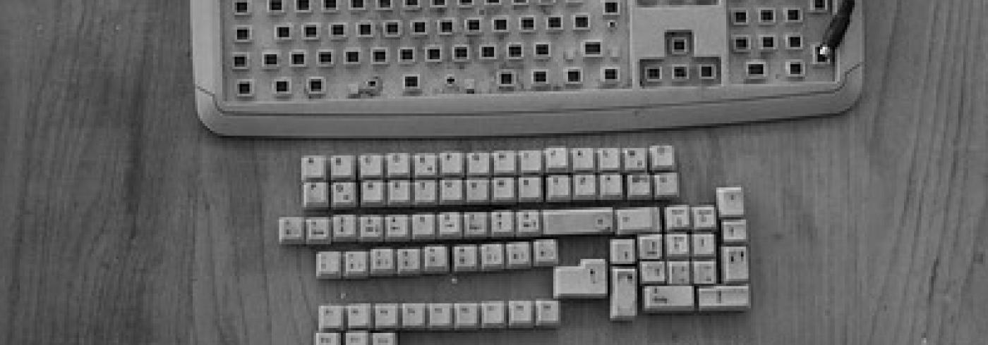 An old keyboard taken apart