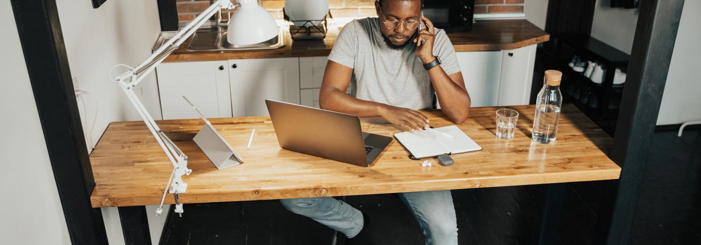 Man at home office desk