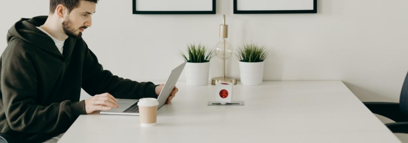 man on computer