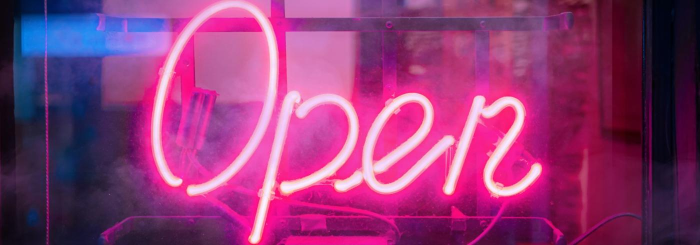 Neon sign saying "open"