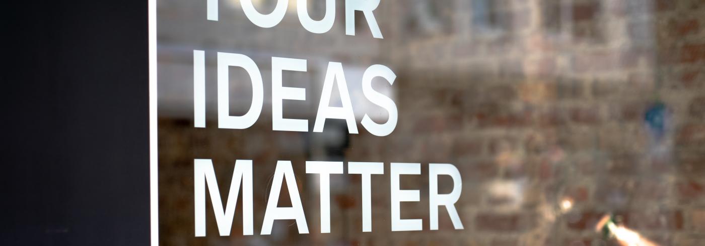 Sign saying "your ideas matter. Write them down"