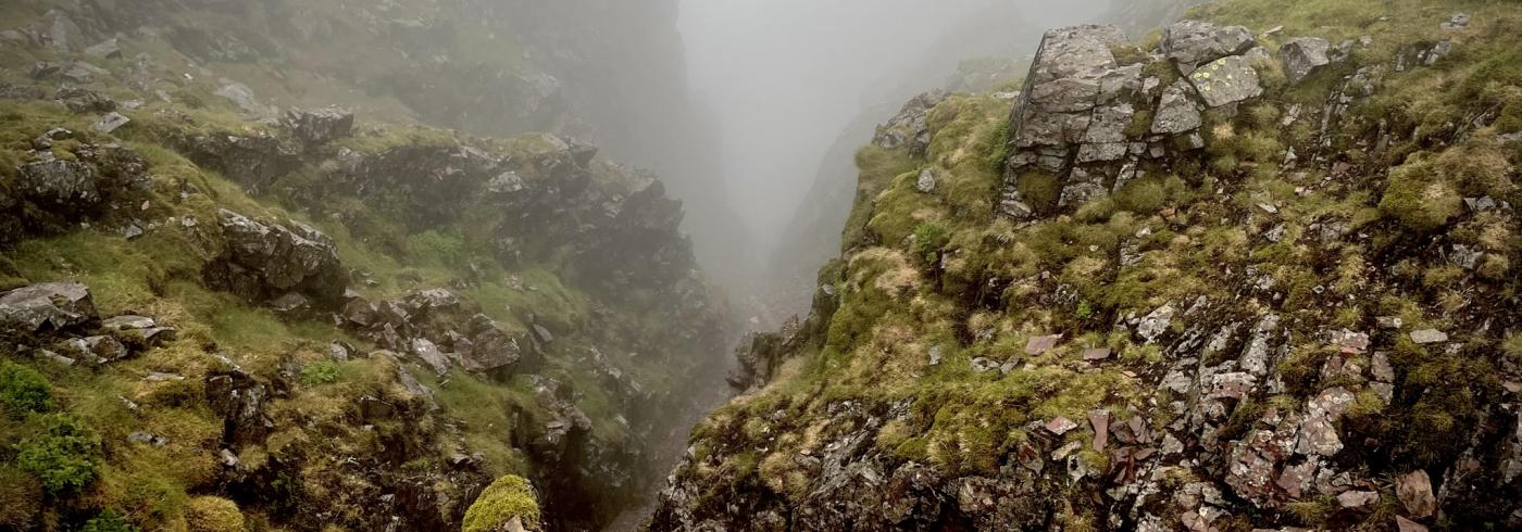 A cloudy view down the West Wall Traverse in the Lake District.