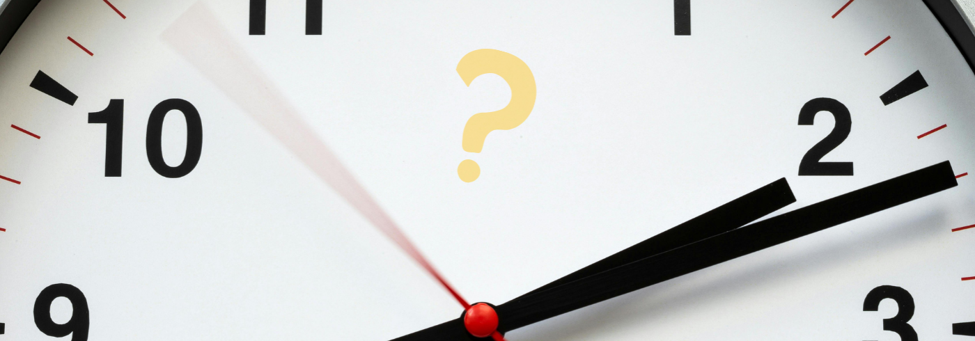 A clock with a question mark on it's face